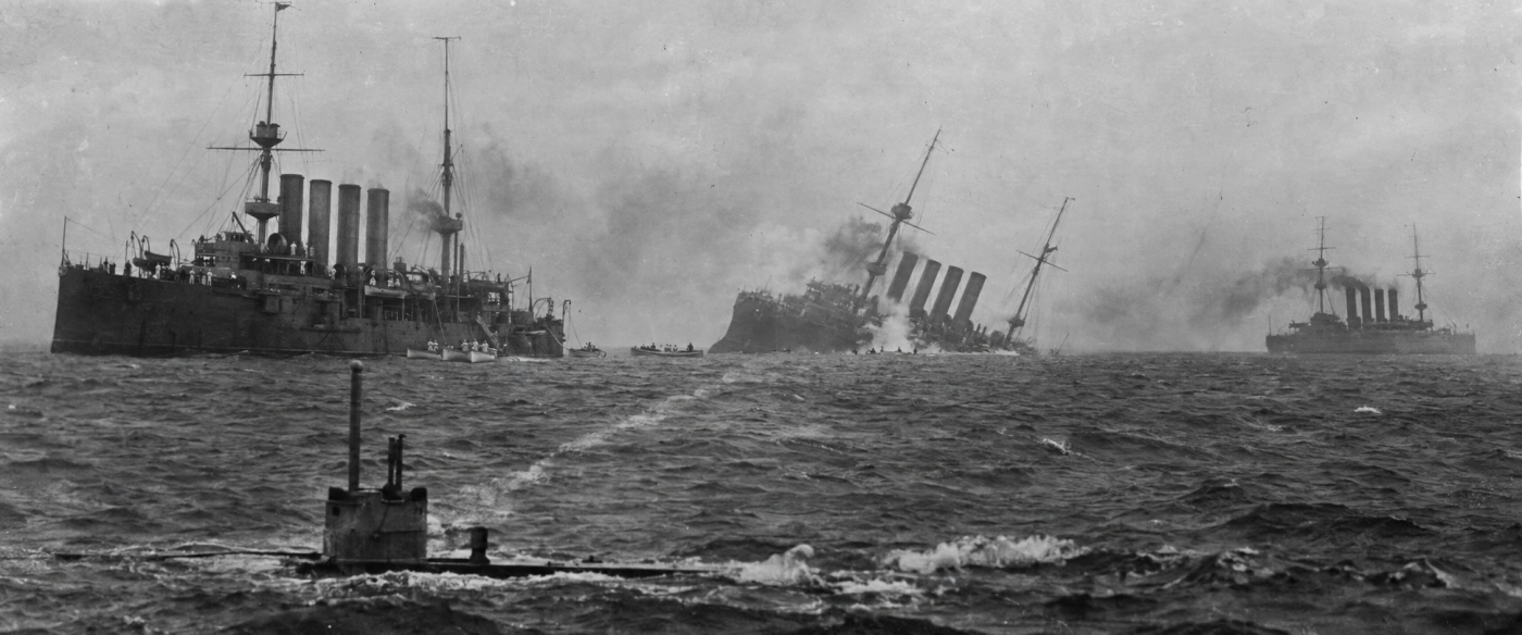 U-9 sinks British ships 