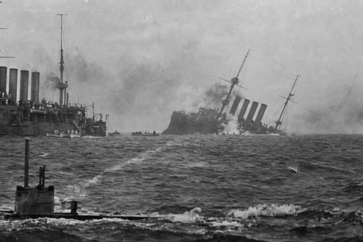 U-9 sinks British ships 