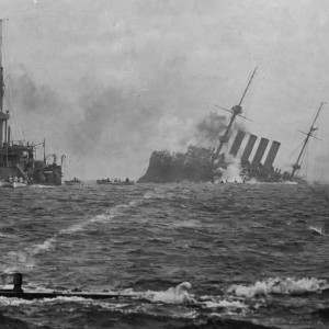 U-9 sinks British ships 